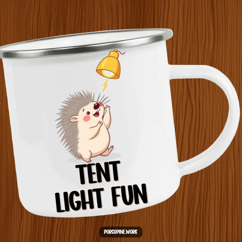 Funny porcupine lamp camping mug showing a porcupine playfully batting at a dangling desk lamp, perfect for enjoying drinks in a fun setting.