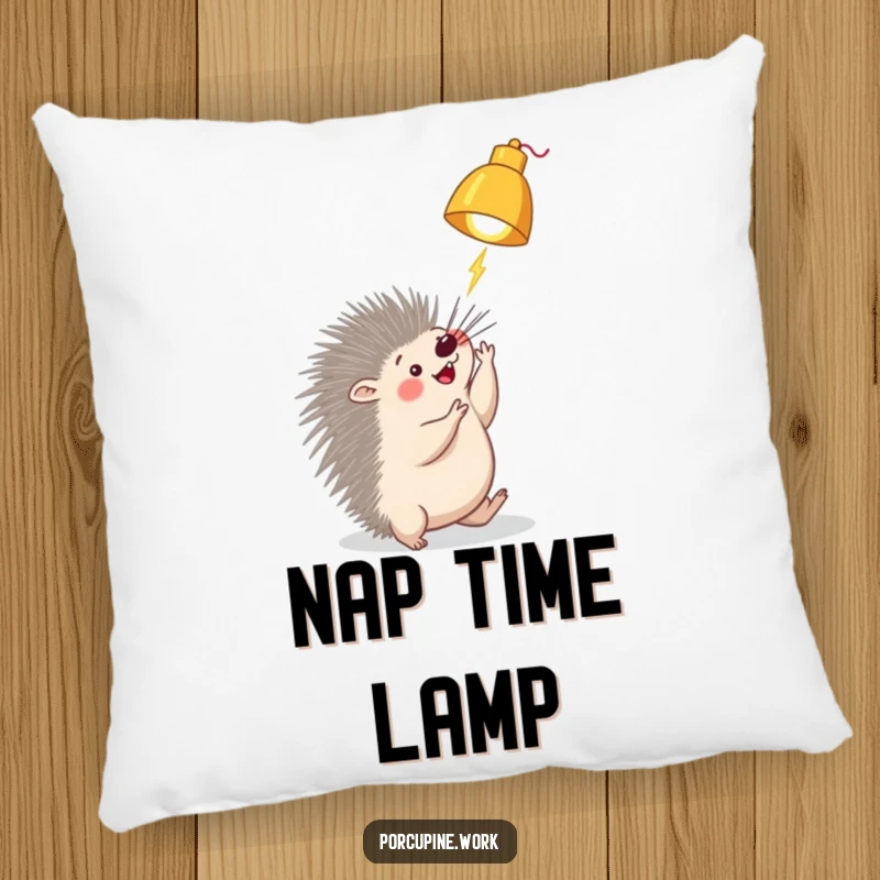 Funny porcupine pillow with a porcupine character playfully batting at a dangling desk lamp, bringing whimsical comfort and humor to any room.