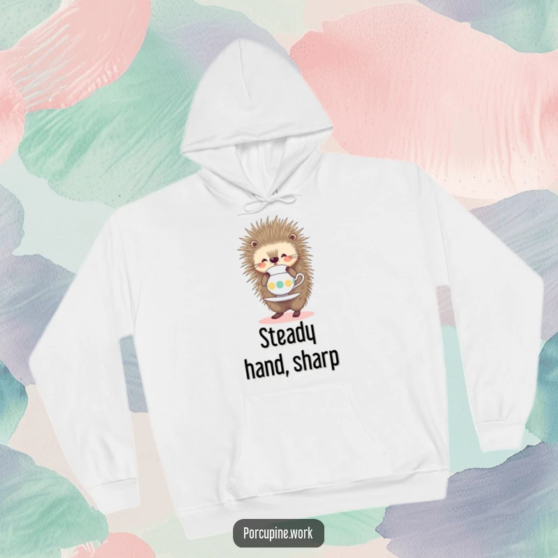 Funny Hoodie depicting a smiling porcupine precariously balancing a teacup on its quills, offering humorous warmth and comfort.