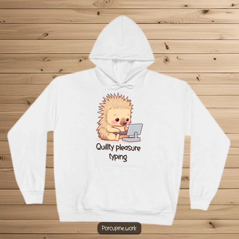 A porcupine struggling to press tiny keys on a small keyboard, depicted on a soft and funny hoodie.