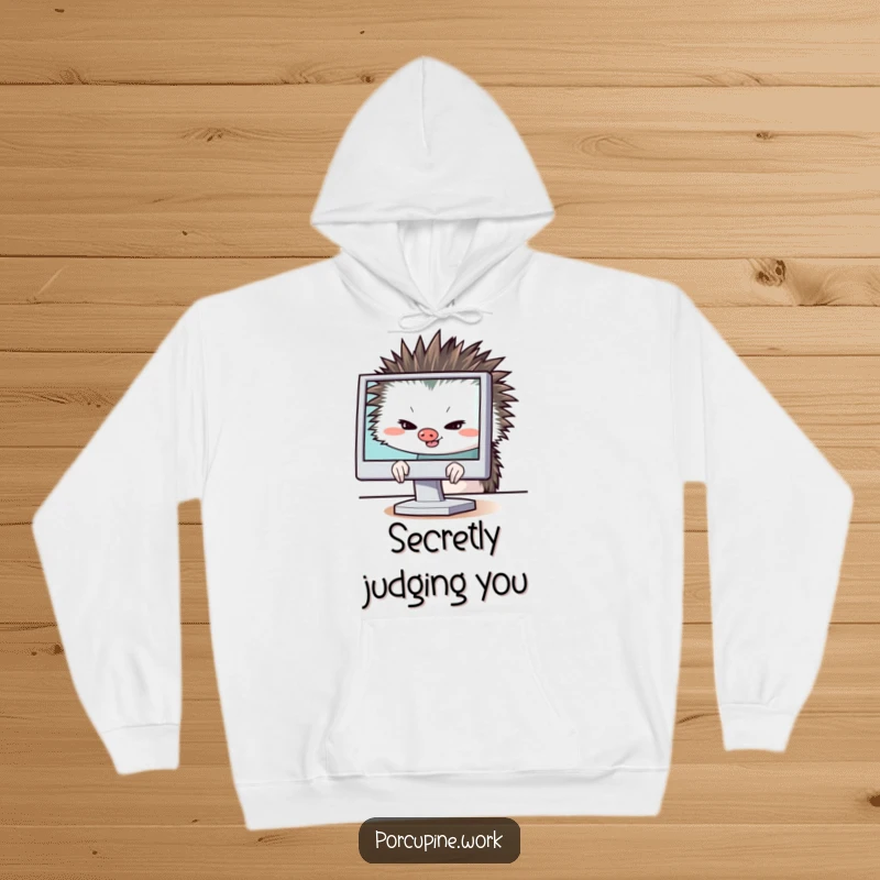 Funny porcupine hiding behind a computer monitor with a sly grin, warm hoodie design, perfect for spies and pranksters.