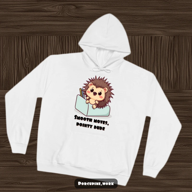 Funny hoodie depicting a startled porcupine hilariously sliding down a desk organizer, a comical representation of office mishaps.