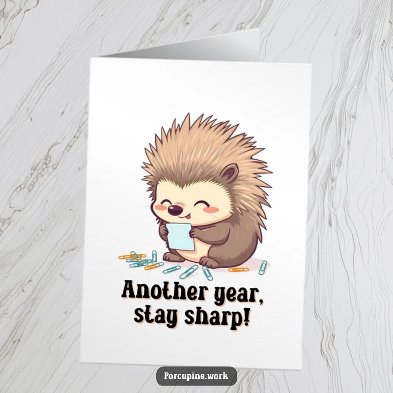 Funny Free Printable Birthday Card: A porcupine looks content organizing tiny paperclips, celebrating neatness.