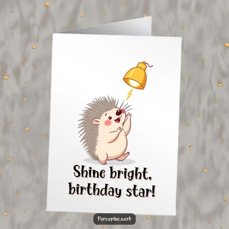 Funny Free Printable Birthday Card: A porcupine playfully bats at a dangling desk lamp, full of energy.