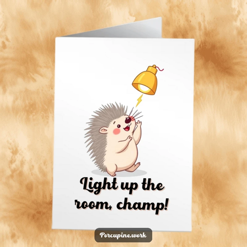 Funny Free Printable Congrats Card: A porcupine playfully batting at a desk lamp, symbolizing bright ideas.