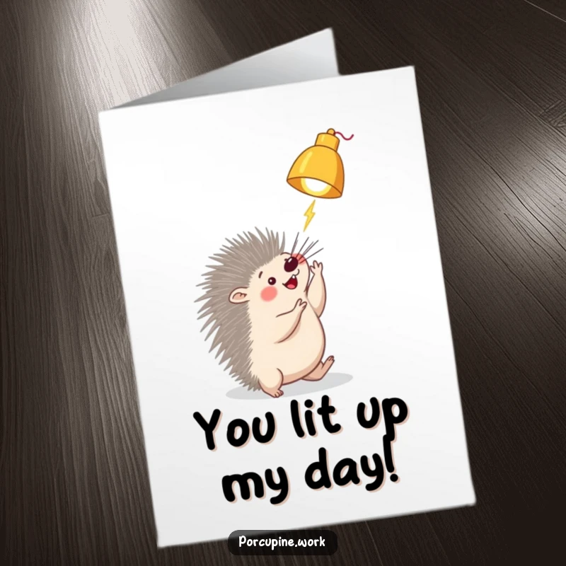 Funny Free Printable Thank You Card: A porcupine playfully bats at a dangling desk lamp, expressing thanks.