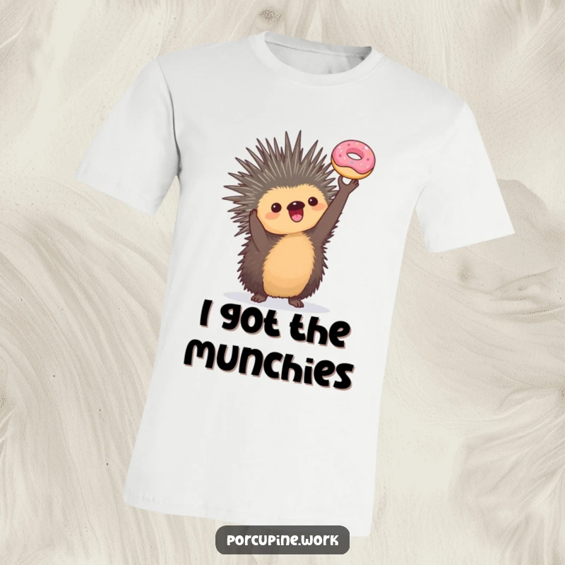 Funny T-shirt with a porcupine triumphantly holding a miniature donut, symbolizing sweet success and delicious achievements for wearers.