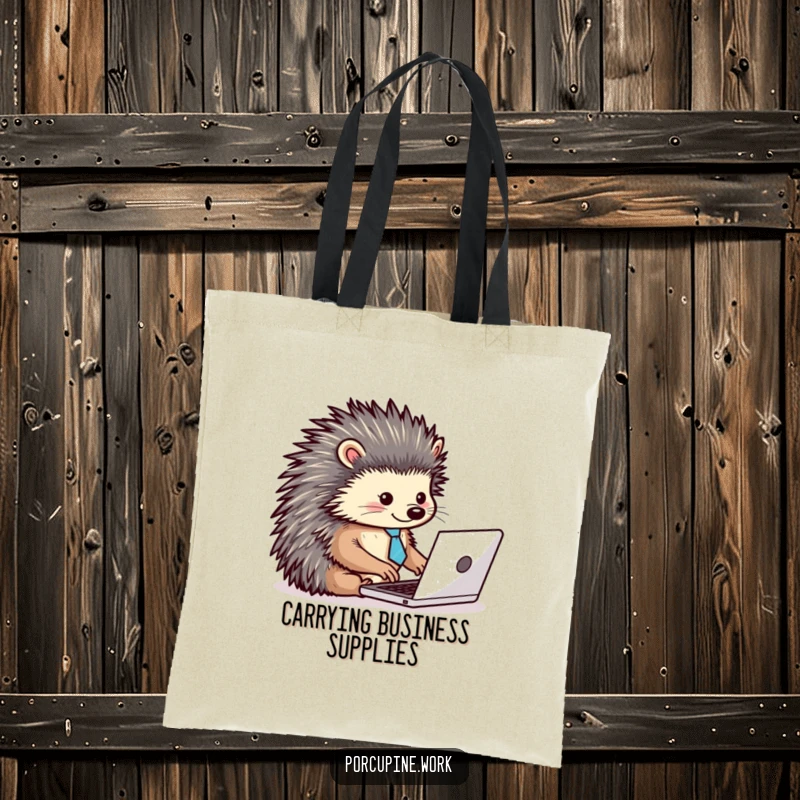 Funny tote bag with a porcupine wearing a tiny tie, energetically typing on a laptop, a humorous accessory for professionals.