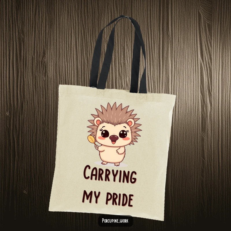 Funny quill presenter porcupine tote bag showing a happy porcupine with wide eyes enthusiastically giving a quill.