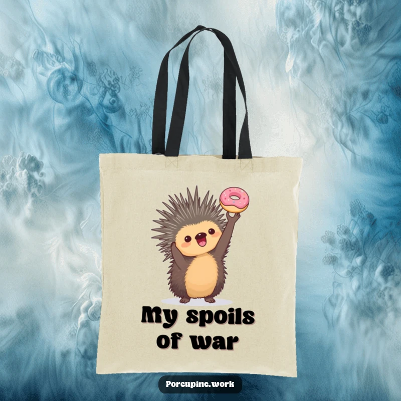 Funny tote bag depicting a porcupine holding a miniature donut triumphantly, ideal for carrying everyday items with a humorous and celebratory flair.